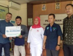 Penyerahan Santunan JKM dari BPJS Ketenagakerjaan Kepada Ahli Waris alm Juangsih Warga Kelurahan Pasanggrahan Baru